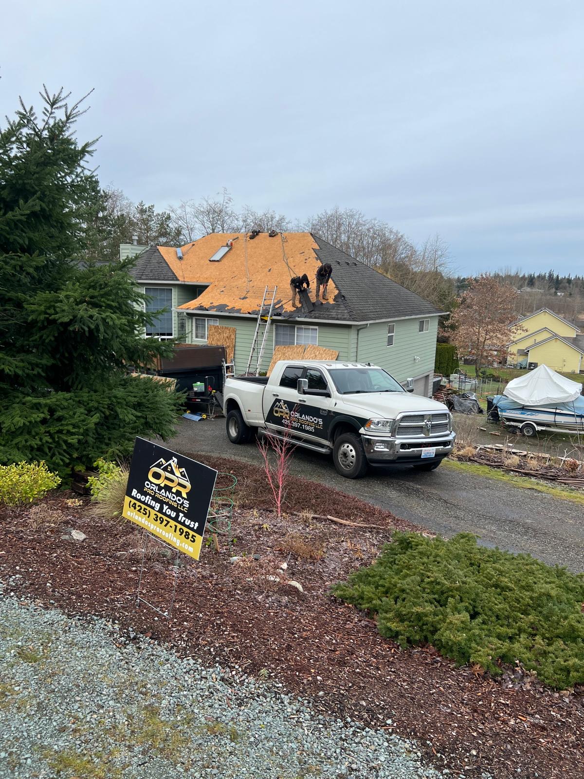 Crew working on roof replacement